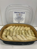 Tray of 24 Hung Uke sour leaf cabbage rolls with the labelled lid behind it