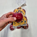 A 3 lb bag of organic McIntosh apples held in hand, with one apple held in front