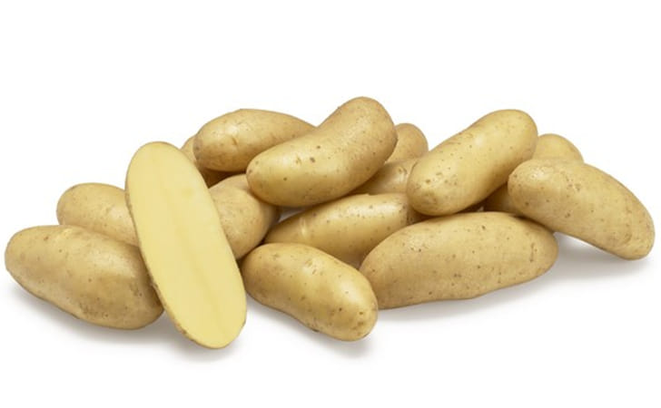 Bellanita fingerling potatoes, yellow skin with pale yellow flesh, one cut lengthwise